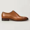 Cap-Toe Oxford in tan leather, side view